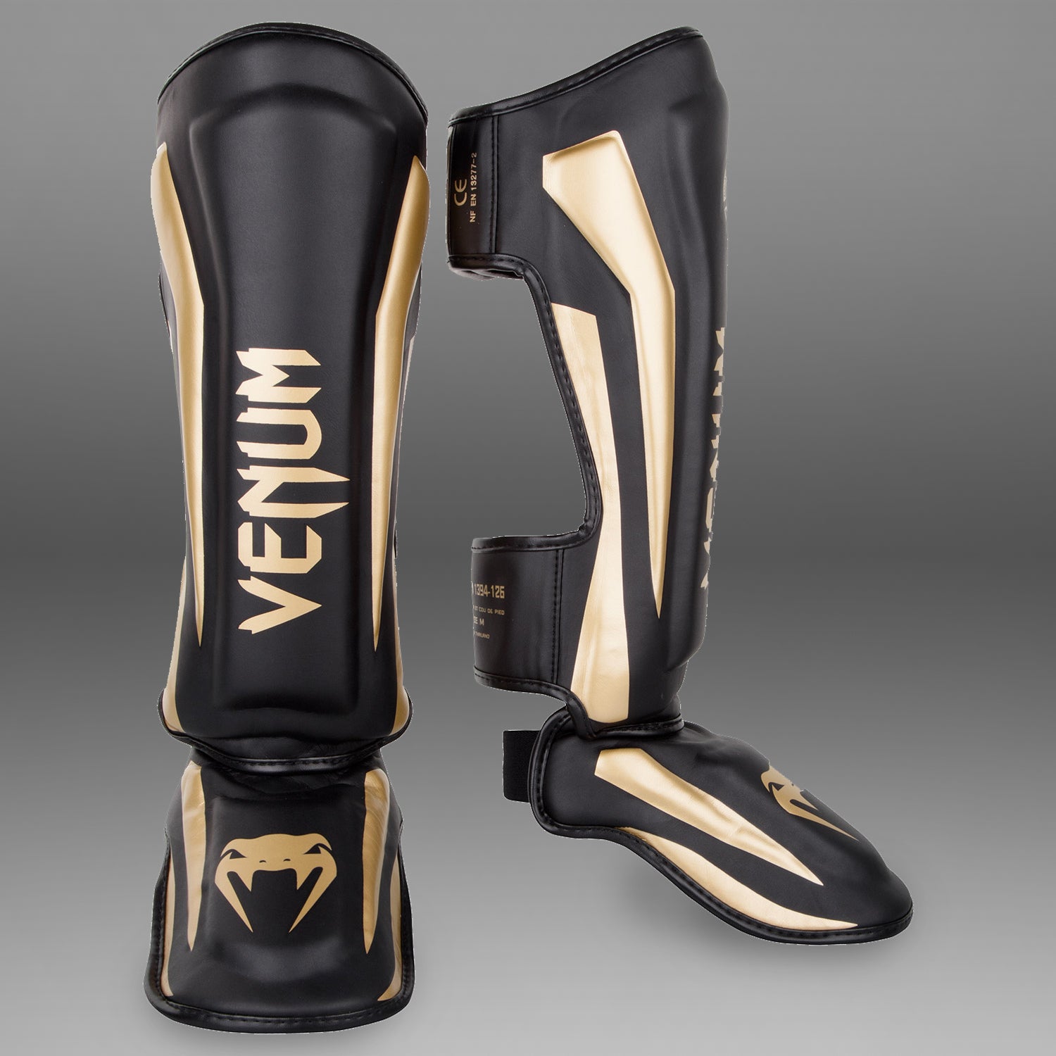 venum-elite-standup-schienbeinsch-tzer-schwarz-gold image 1