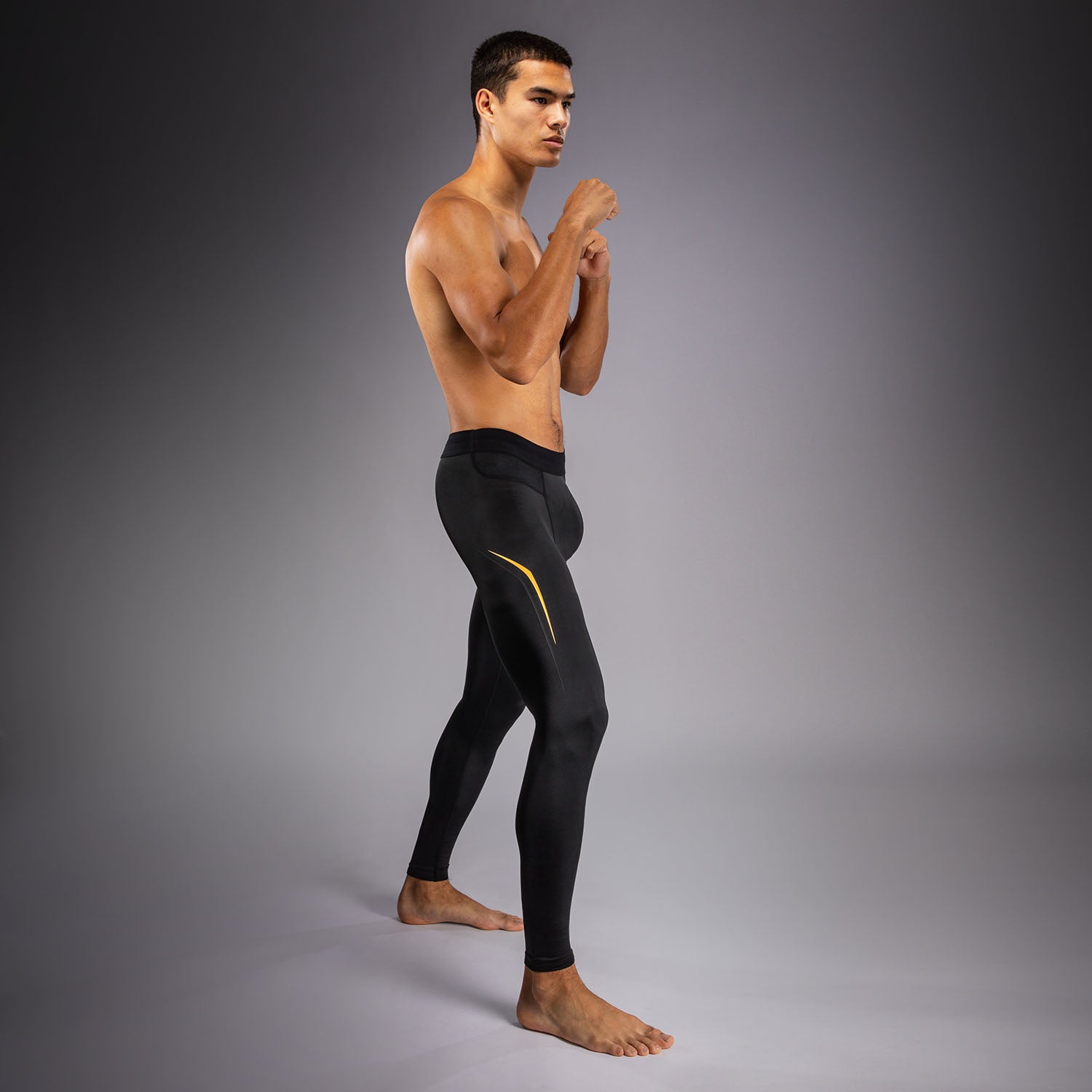 venum-g-core-spats-herren-schwarz-gold-kompressionshose-grappling image 3