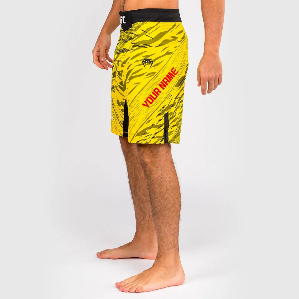 ufc-fusion-by-venum-authentic-fight-night-fight-short-long-fit-herren-gelb-perso image 1