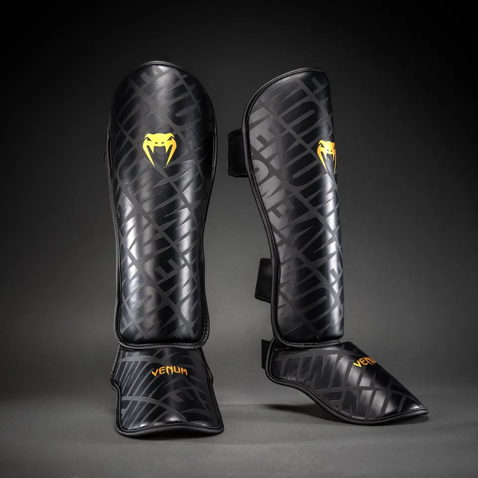 venum-contender-1-5-xt-3d-schienbeinschoner-schwarz-gold image 1