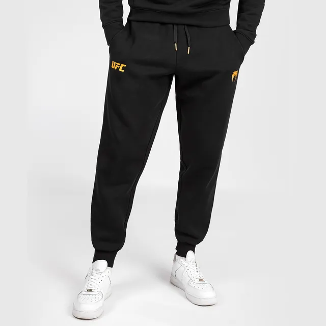 ufc-adrenaline-by-venum-replica-herrenhose-champion-schwarz-gold image 1