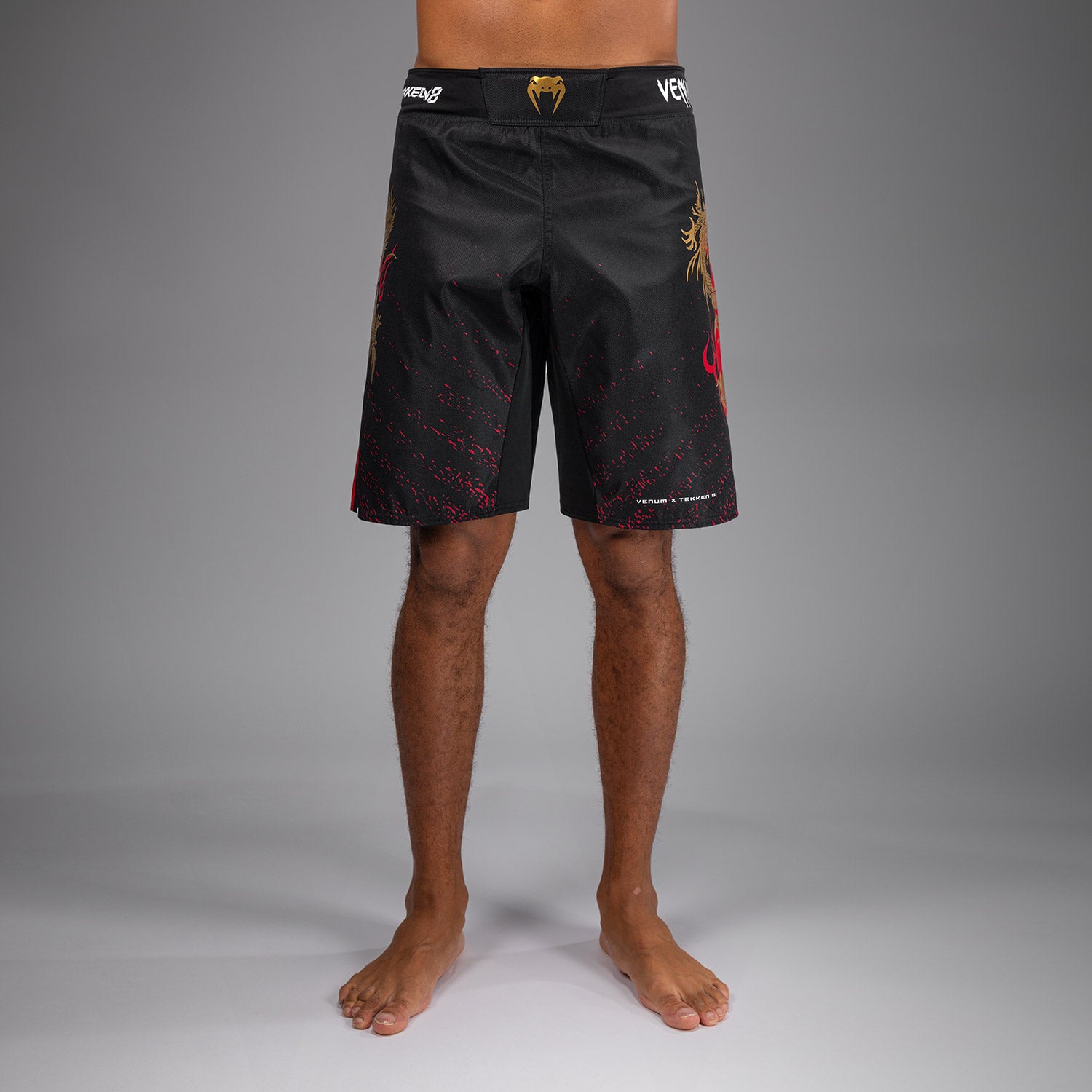 venum-x-tekken-8-marshall-law-fight-shorts-schwarz-rot-gold image 1