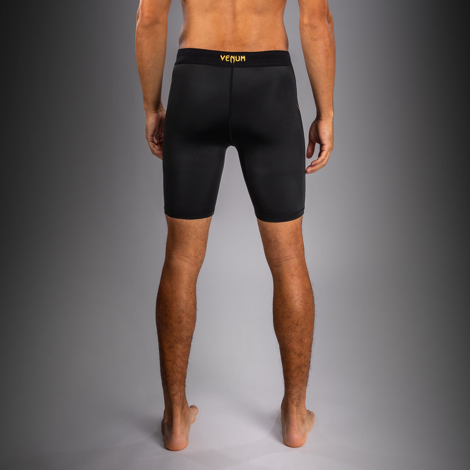 venum-g-core-vale-tudo-kompressionsshort-schwarz-gold image 2