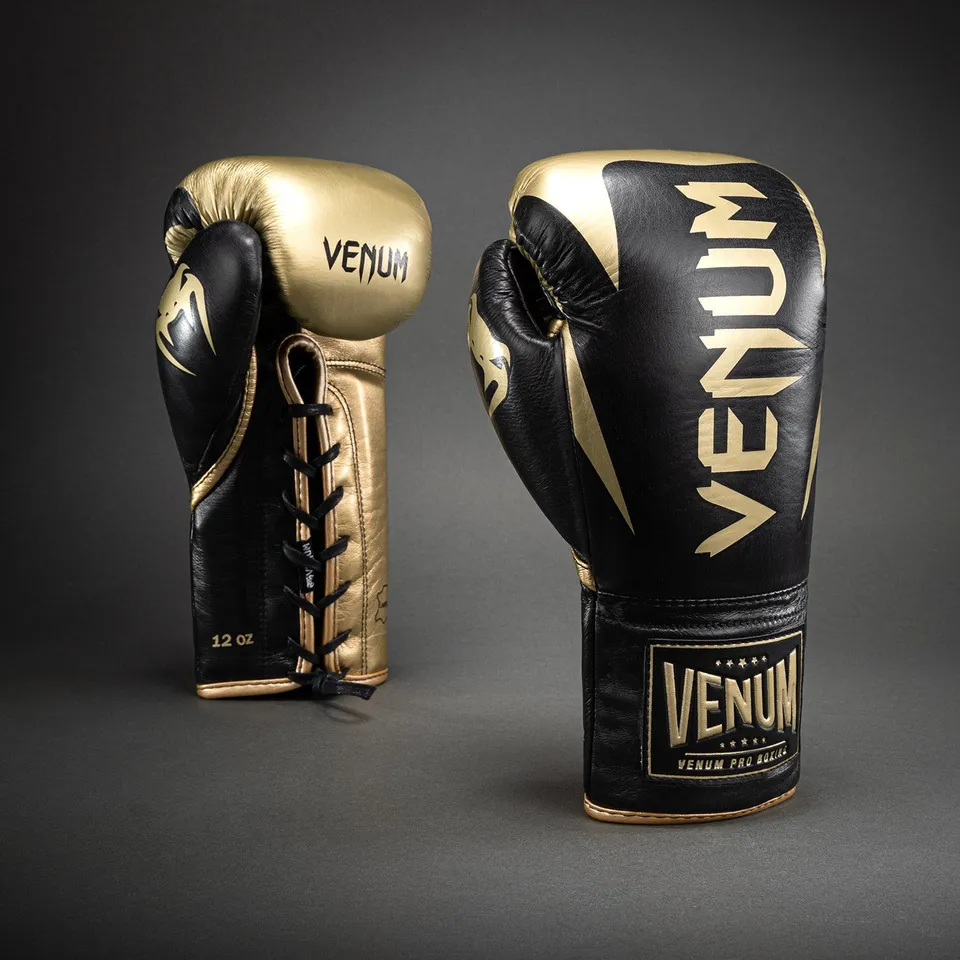 venum-hammer-profi-boxhandschuhe-mit-schn-rung-schwarz-gold image 1