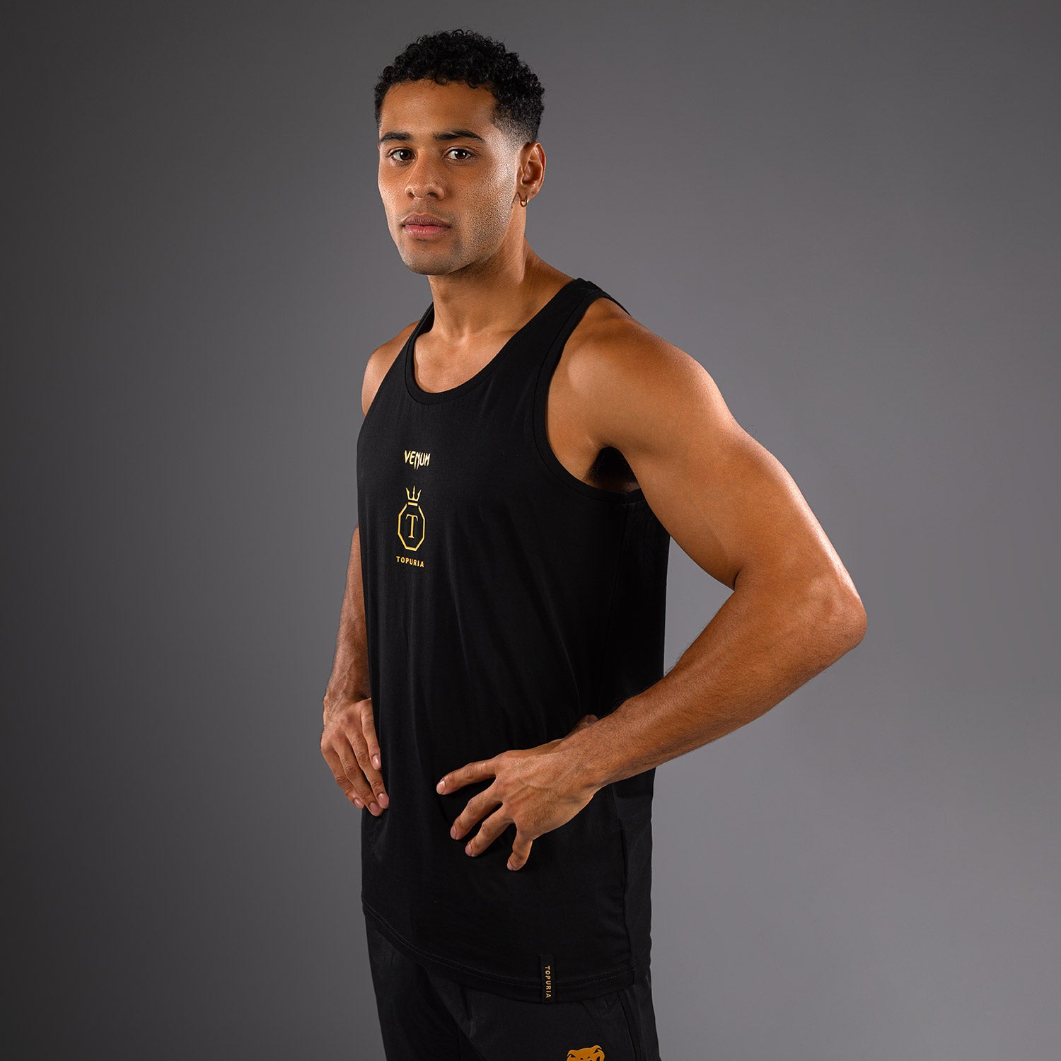 venum-x-topuria-unmatched-edition-tank-top-herren-schwarz-gold image 1