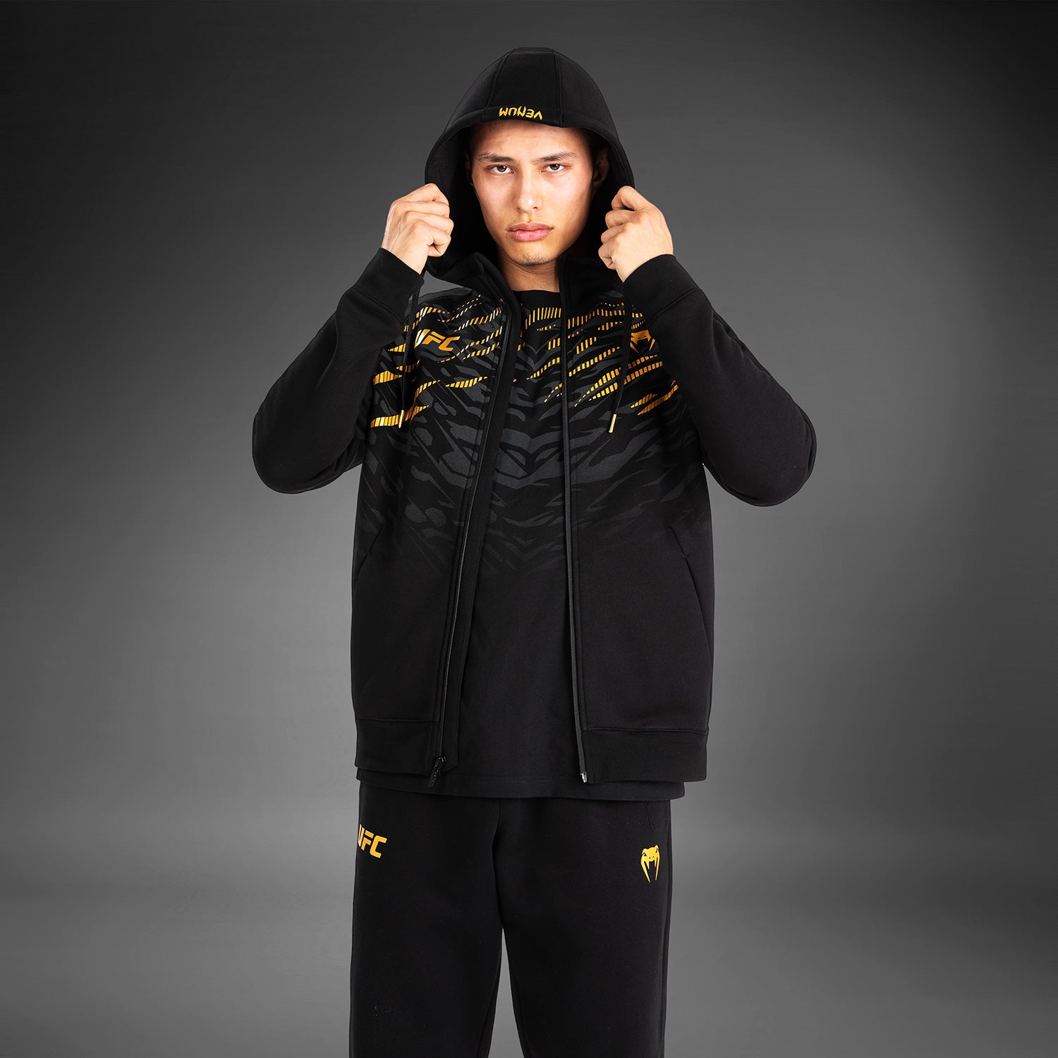 ufc-fusion-by-venum-replica-herren-zip-hoodie-champion-schwarz-gold image 3