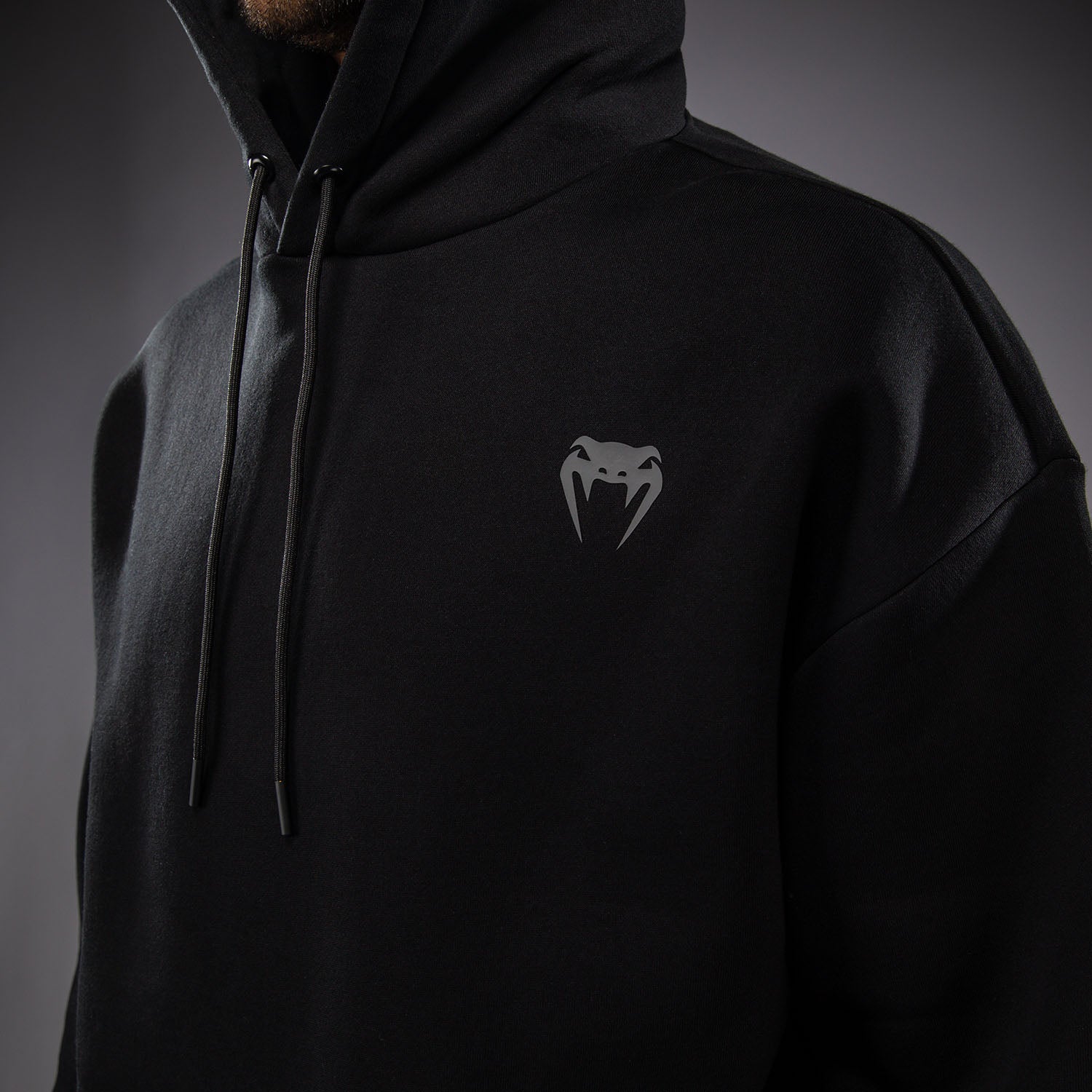 venum-divide-winter-kapuzenpullover-schwarz image 5