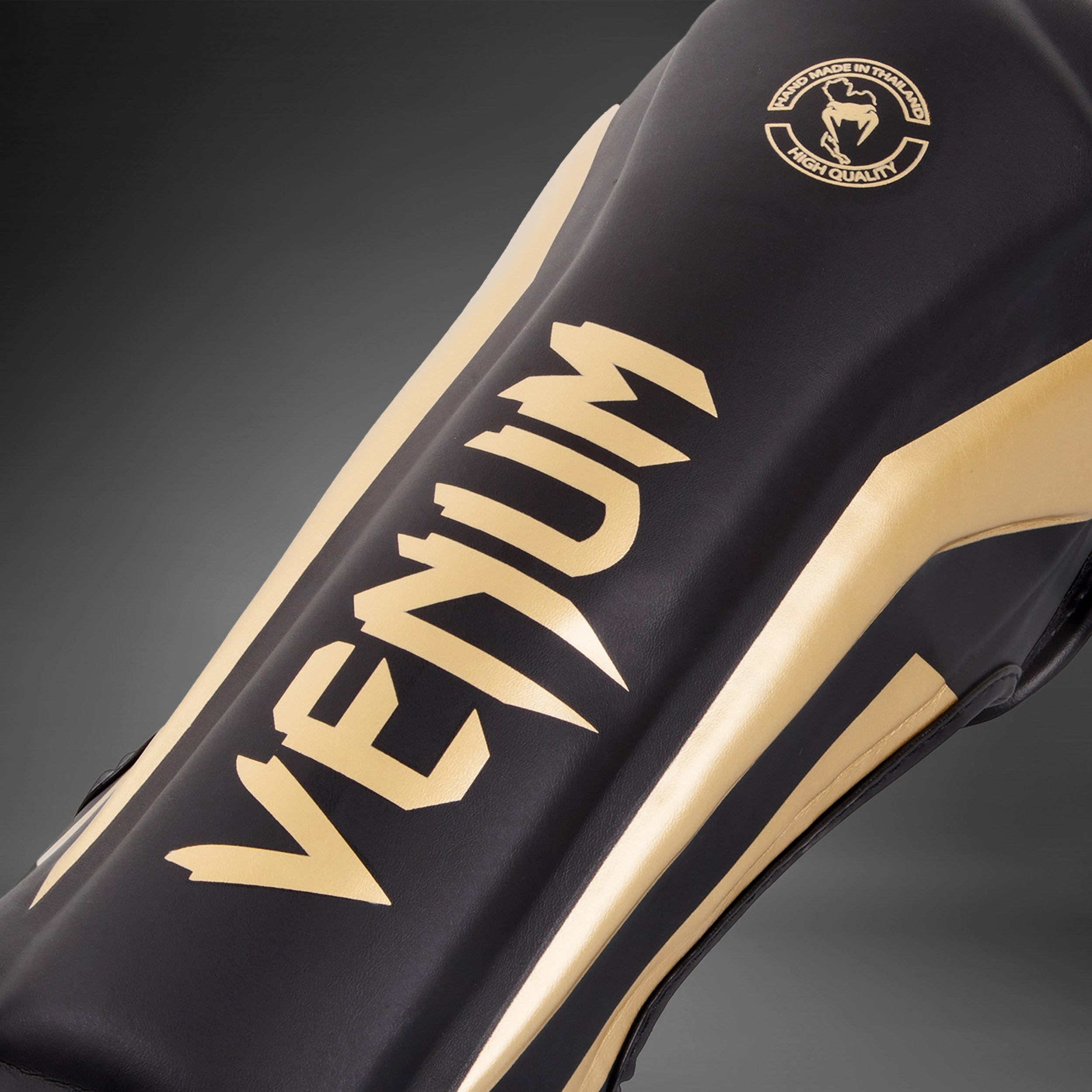 venum-elite-standup-schienbeinsch-tzer-schwarz-gold image 2