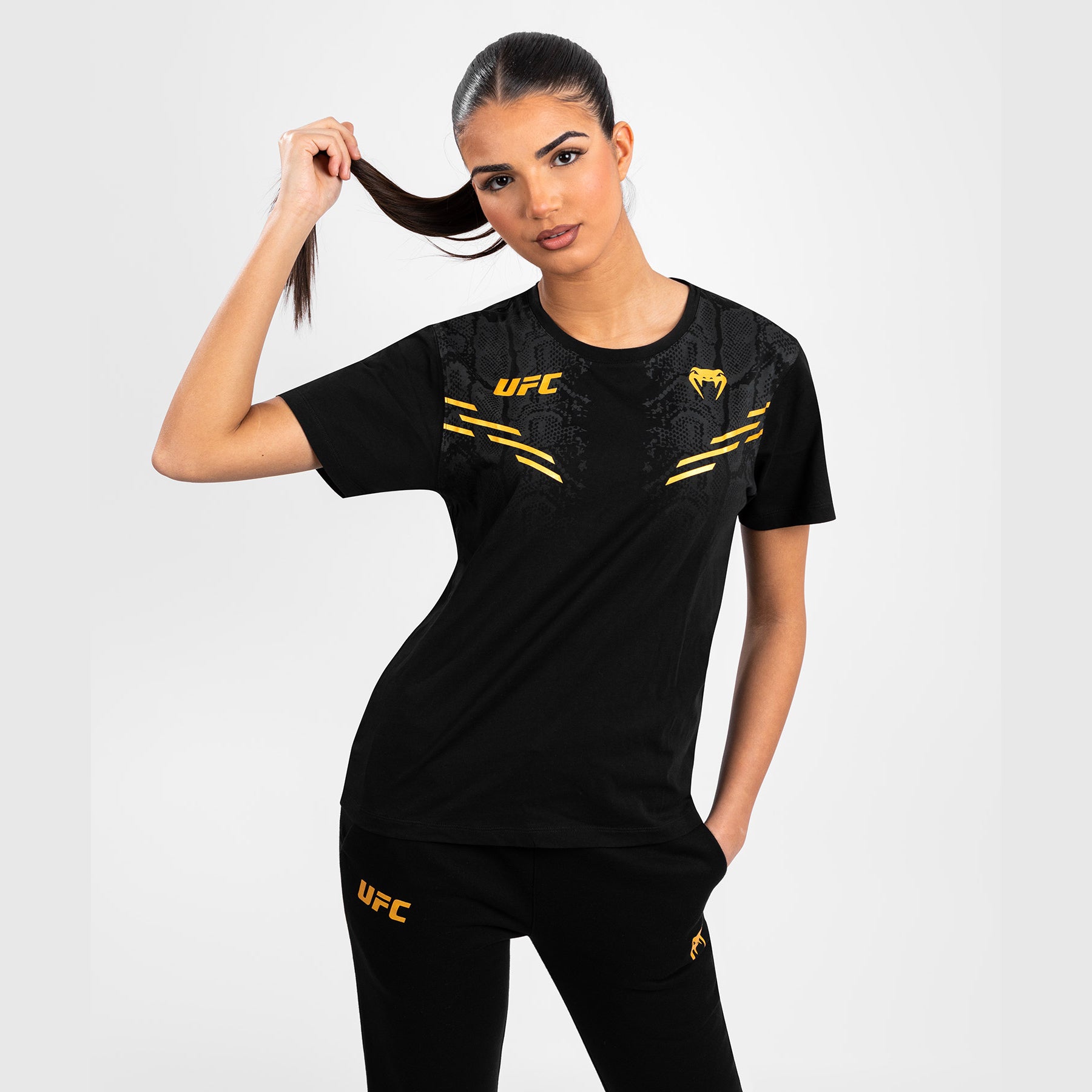 ufc-adrenaline-by-venum-replica-damen-t-shirt-champion-schwarz-gold image 1