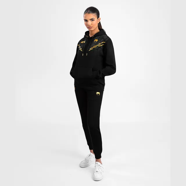venum-ufc-adrenaline-by-venum-replica-champion-damen-jogginghose-schwarz-gold image 1