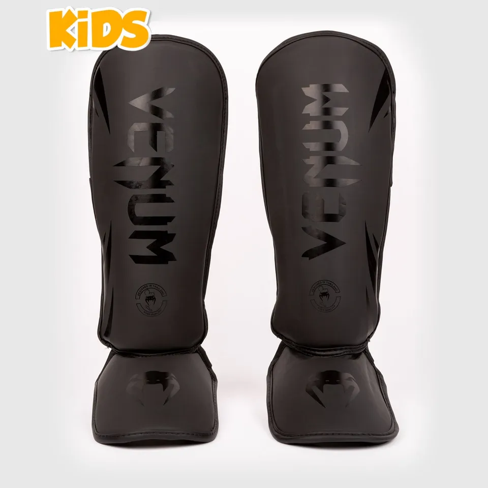 venum-challenger-schienbeinschoner-kinder-schwarz-schwarz image 1