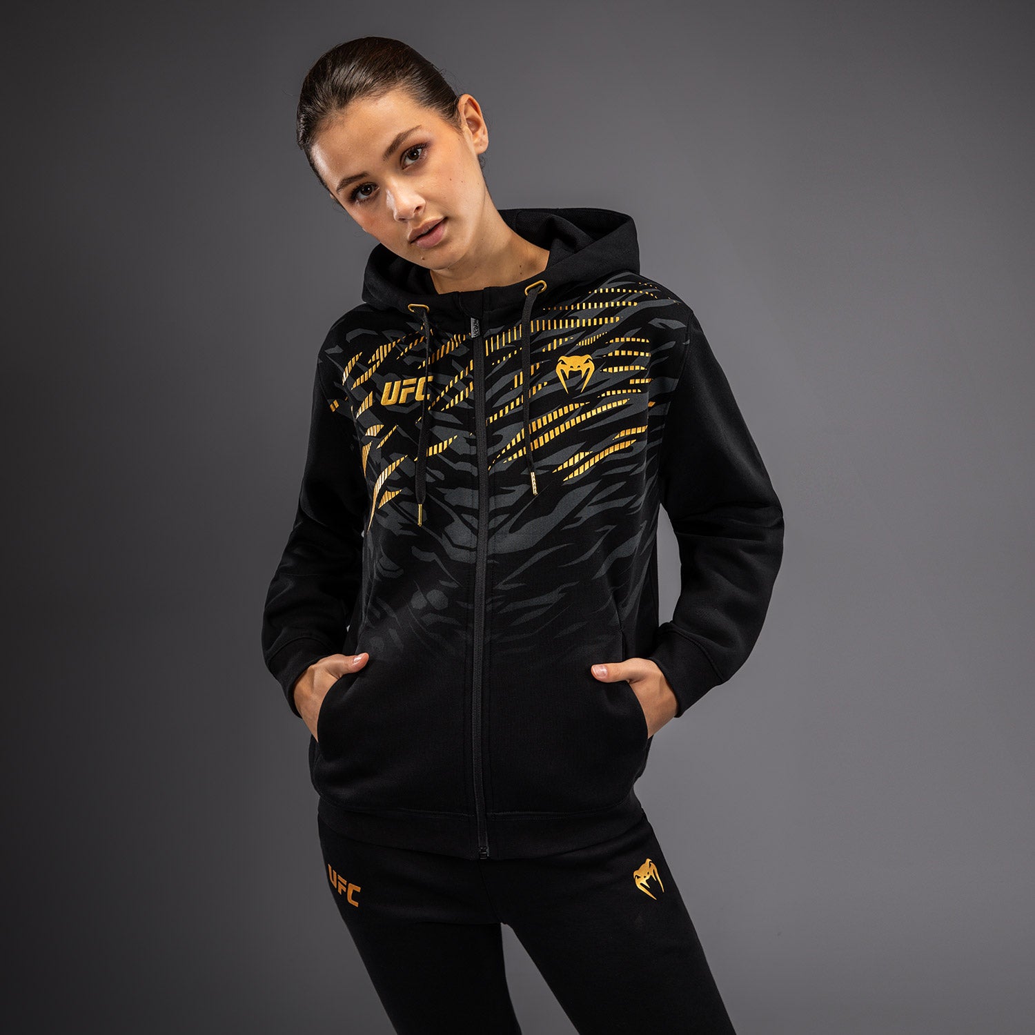 ufc-fusion-by-venum-replica-zip-hoodie-damen-champion-schwarz-gold image 1