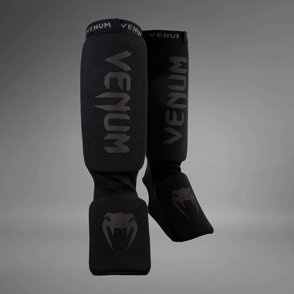 venum-kontact-schienbeinschoner-schwarz-schwarz-muay-thai-kickboxen-mma image 1