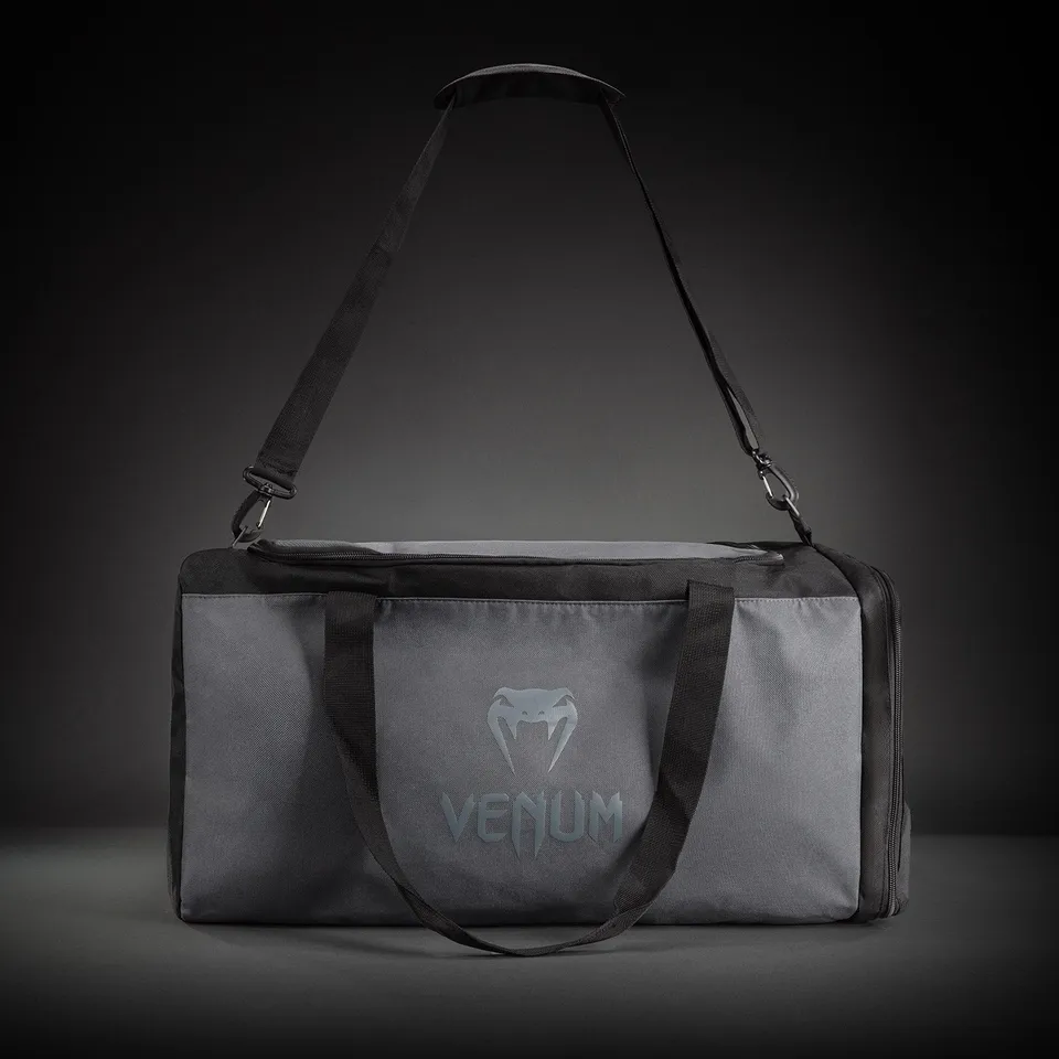 venum-essential-sporttasche-61-l-duffle-bag-grau-schwarz image 1