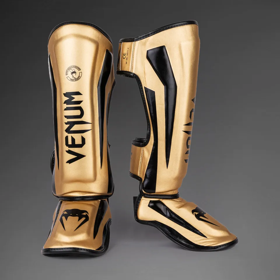 venum-elite-standup-schienbeinschoner-gold-schwarz image 1