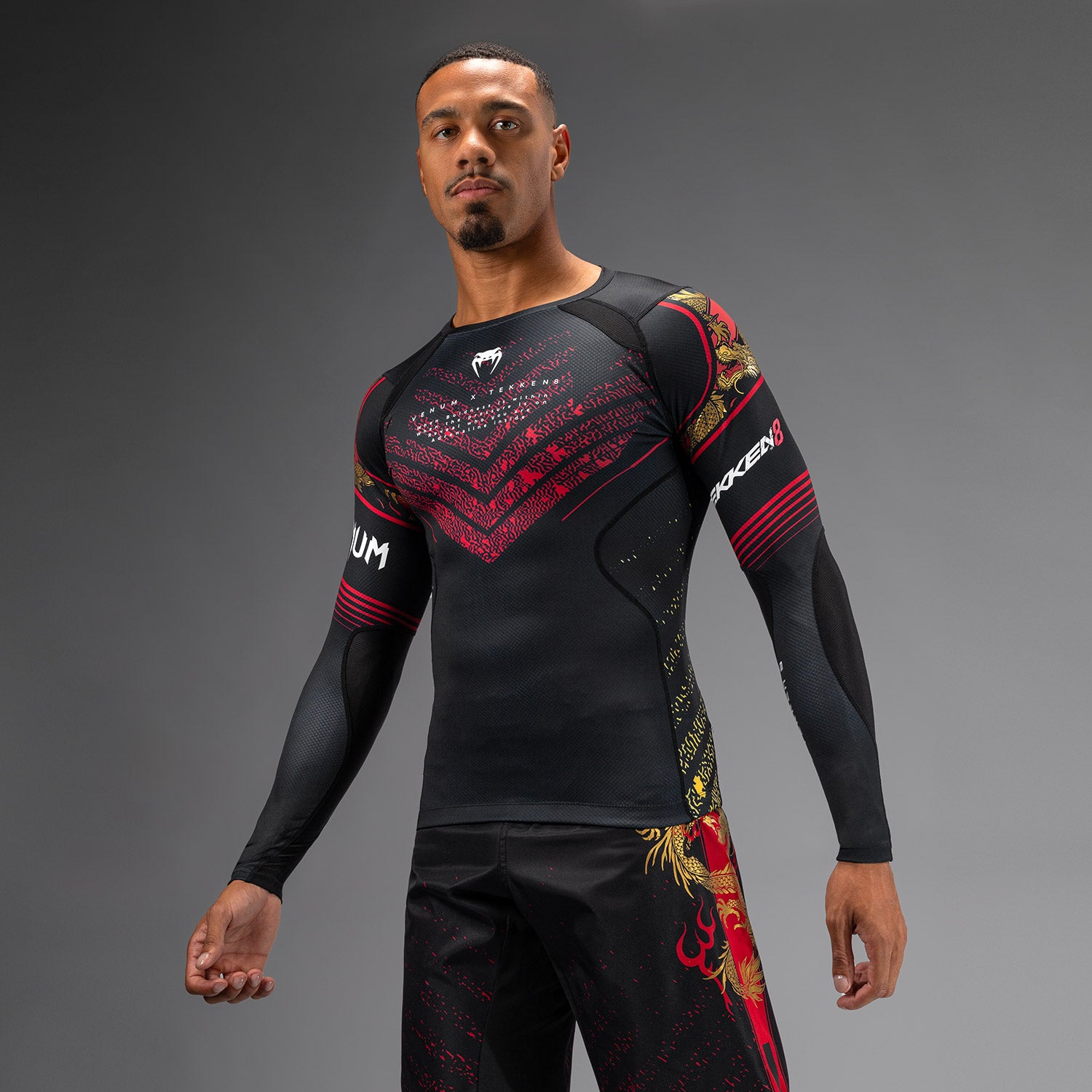 venum-x-tekken-8-marshall-law-rashguard-schwarz-rot-gold image 1
