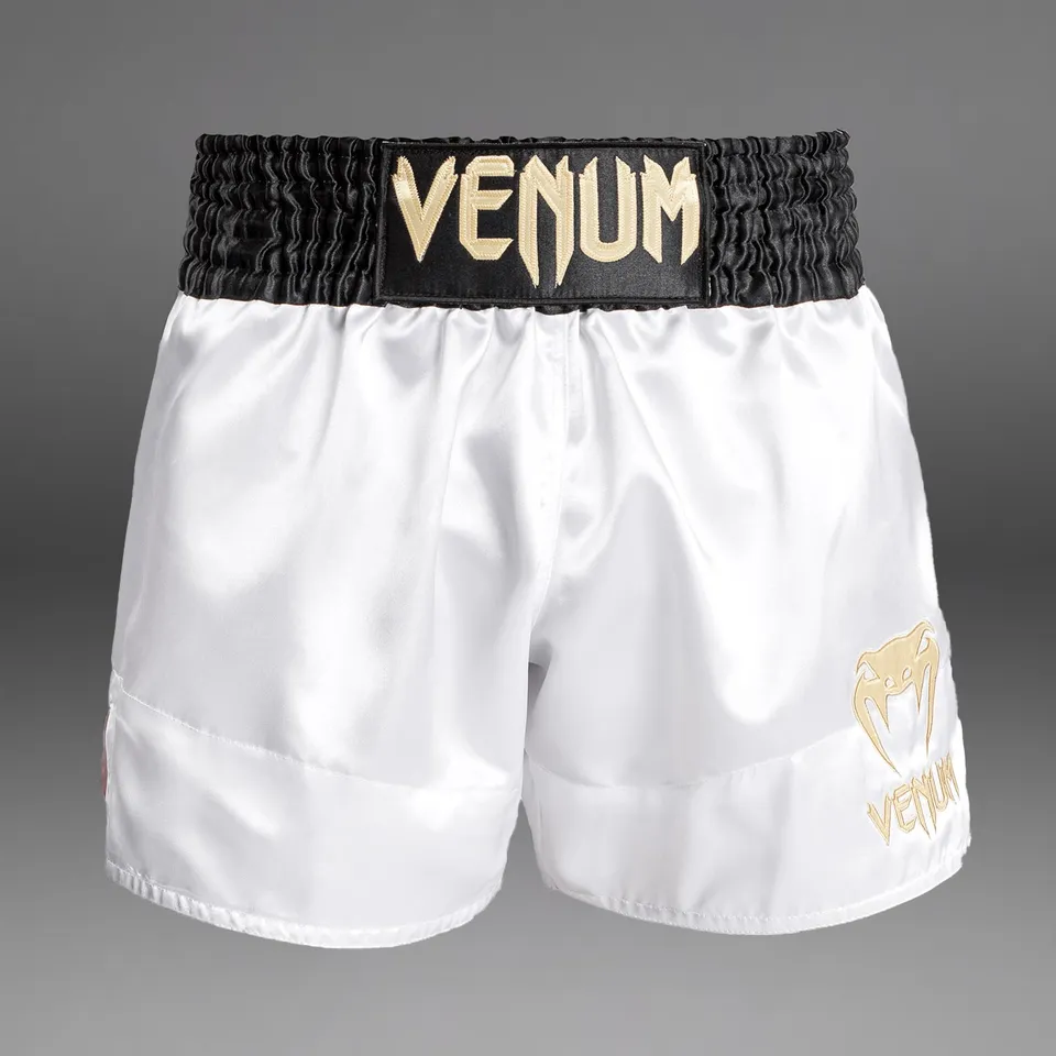 venum-classic-kurze-muay-thai-shorts-noir-blanc-or-wei image 1