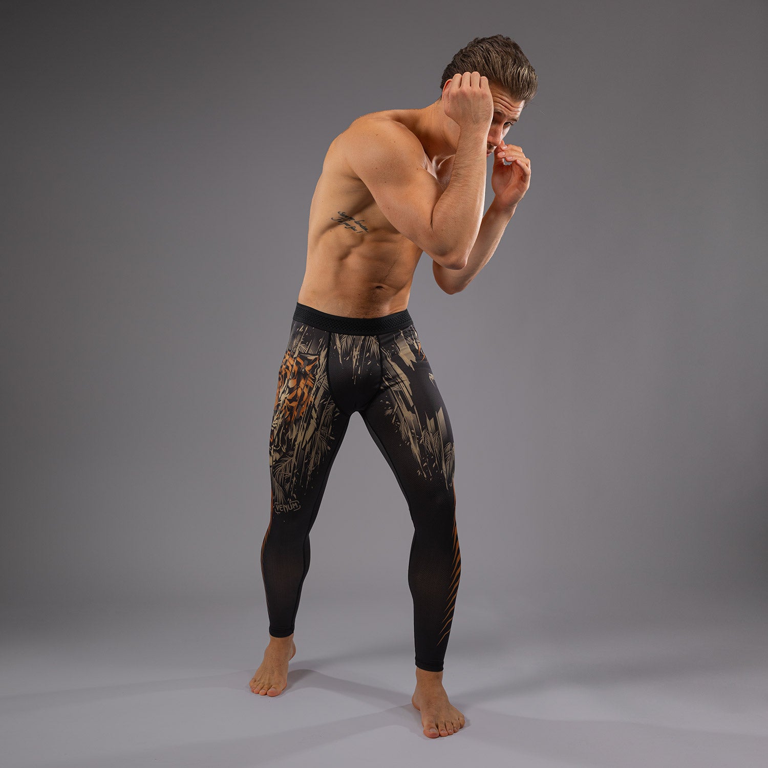 venum-tiger-herren-spats-schwarz-neonorange image 1
