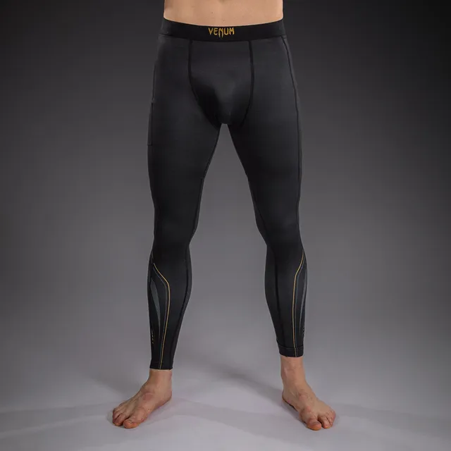 venum-streamline-spats-herren-schwarz-gold-bjj-mma-kompressionshose image 1