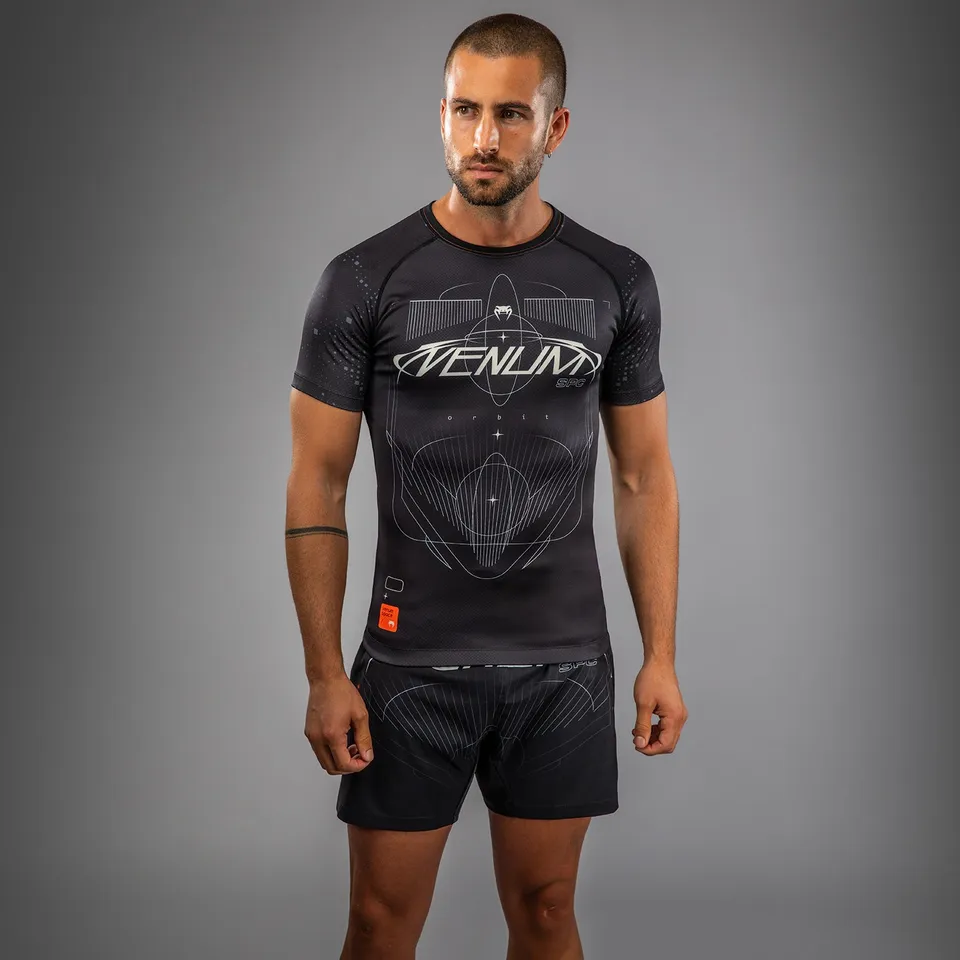 venum-eclipse-kurzarm-rashguard-schwarz-elfenbein image 1