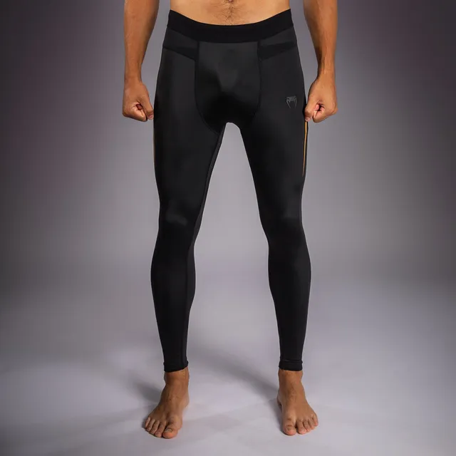 venum-g-core-spats-herren-schwarz-gold-kompressionshose-grappling image 1