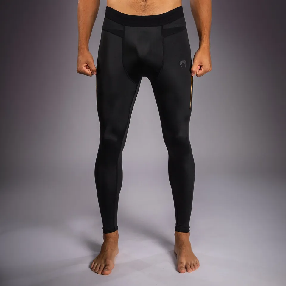 venum-g-core-spats-herren-schwarz-gold-kompressionshose-grappling image 1