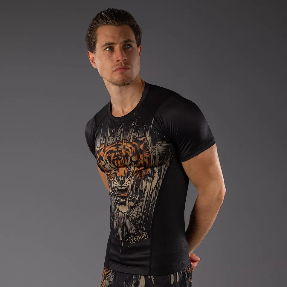 venum-tiger-herren-kurzarm-rashguard-schwarz-neonorange image 1