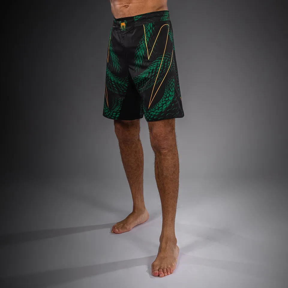 venum-matupa-fightshorts-herren-schwarz-gr-n-gold image 1
