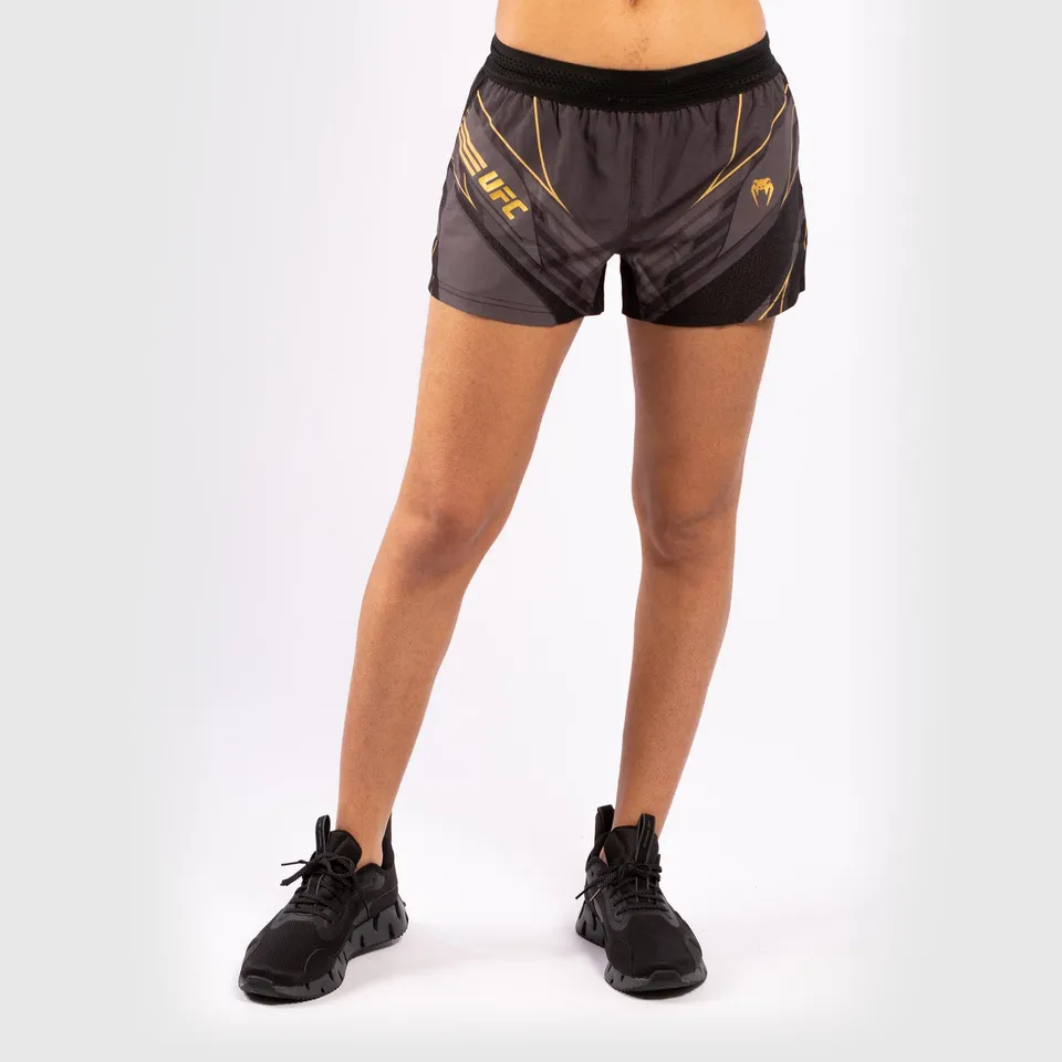 ufc-venum-replica-trainingsshorts-f-r-damen-champion-schwarz-gold image 1