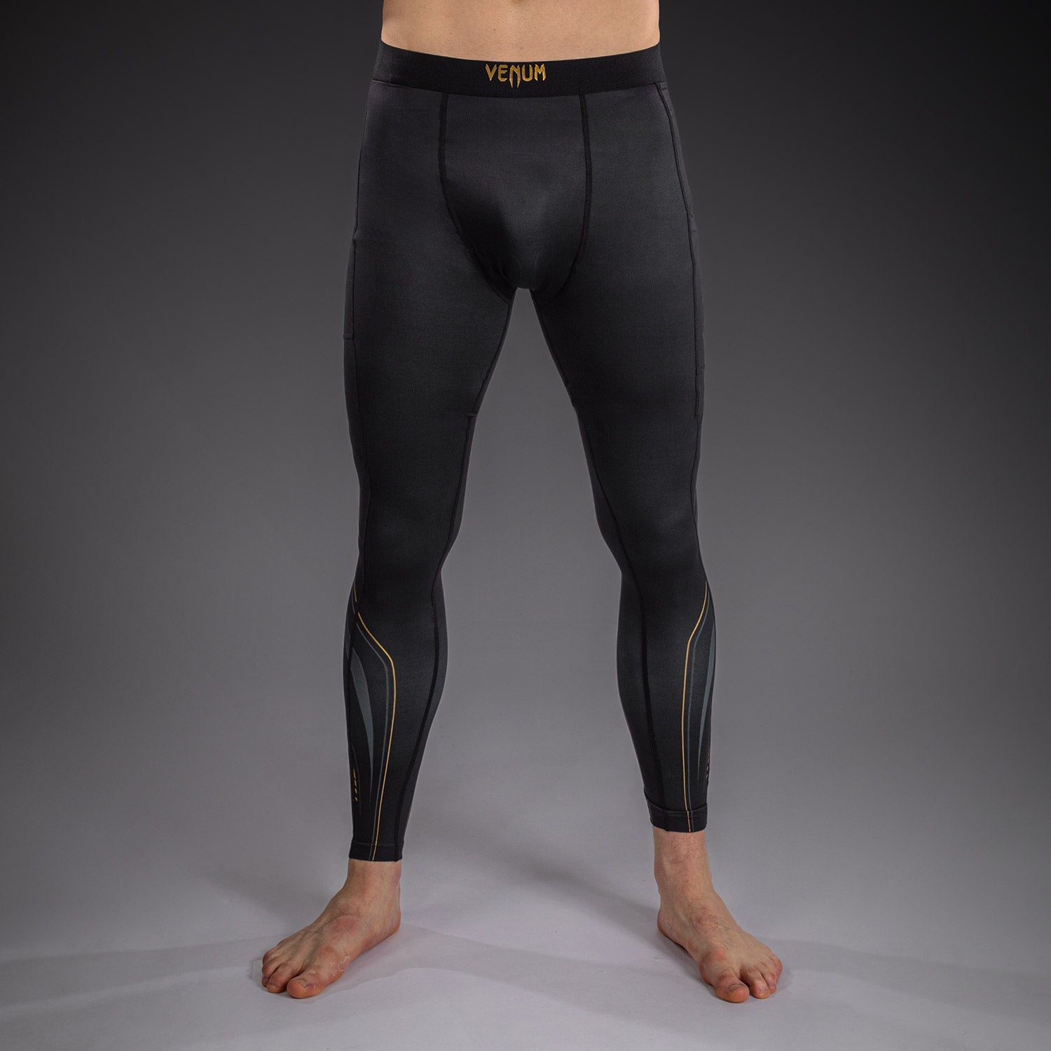 venum-streamline-spats-herren-schwarz-gold-bjj-mma-kompressionshose image 1