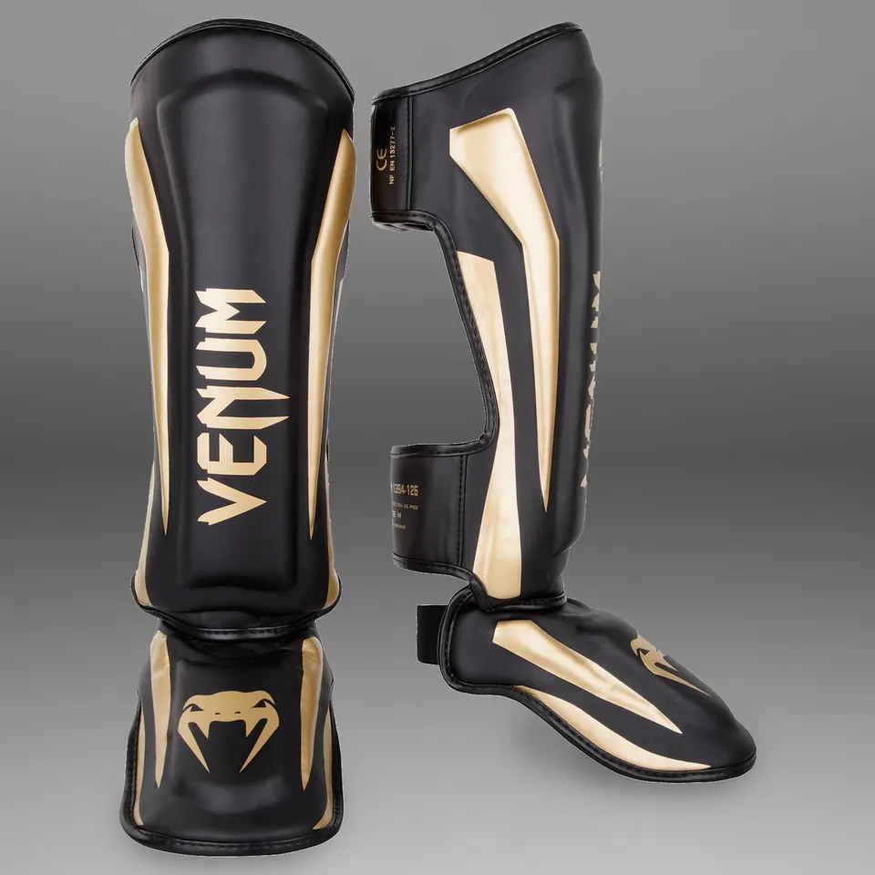 venum-elite-standup-schienbeinsch-tzer-schwarz-gold image 1