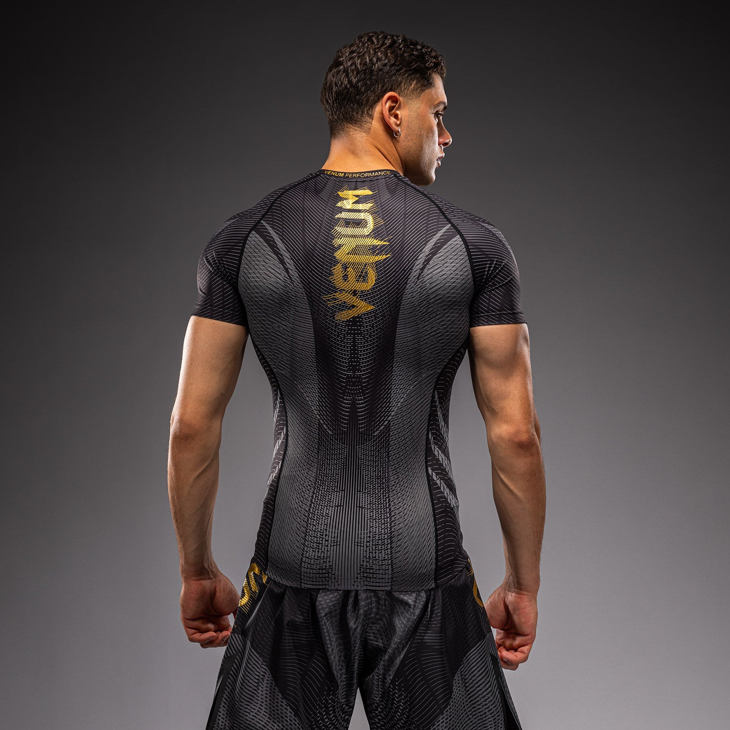 venum-galactic-3-0-kurzarm-rashguard-herren-schwarz-gold image 3