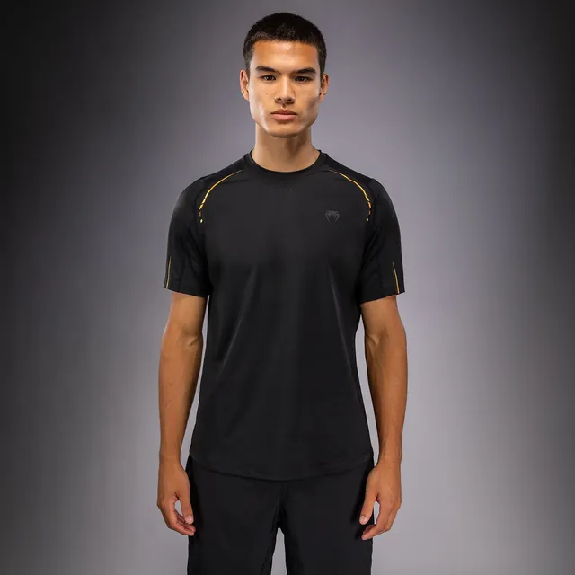 venum-g-core-dry-tech-t-shirt-herren-schwarz-gold image 1
