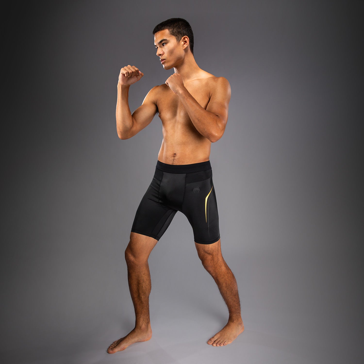 venum-g-core-vale-tudo-kompressionsshort-schwarz-gold image 4