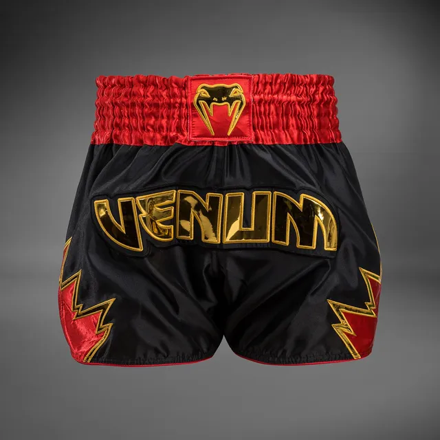 venum-inferno-muay-thai-shorts-schwarz-gold-rot image 1