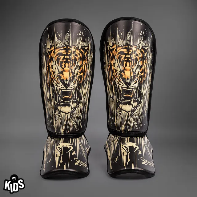 venum-tiger-kinder-schienbeinschoner-schwarz-neon-orange image 1