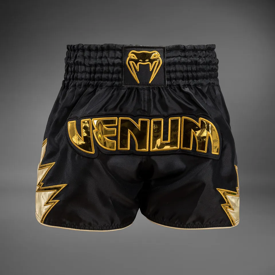 venum-inferno-muay-thai-shorts-schwarz-gold image 1