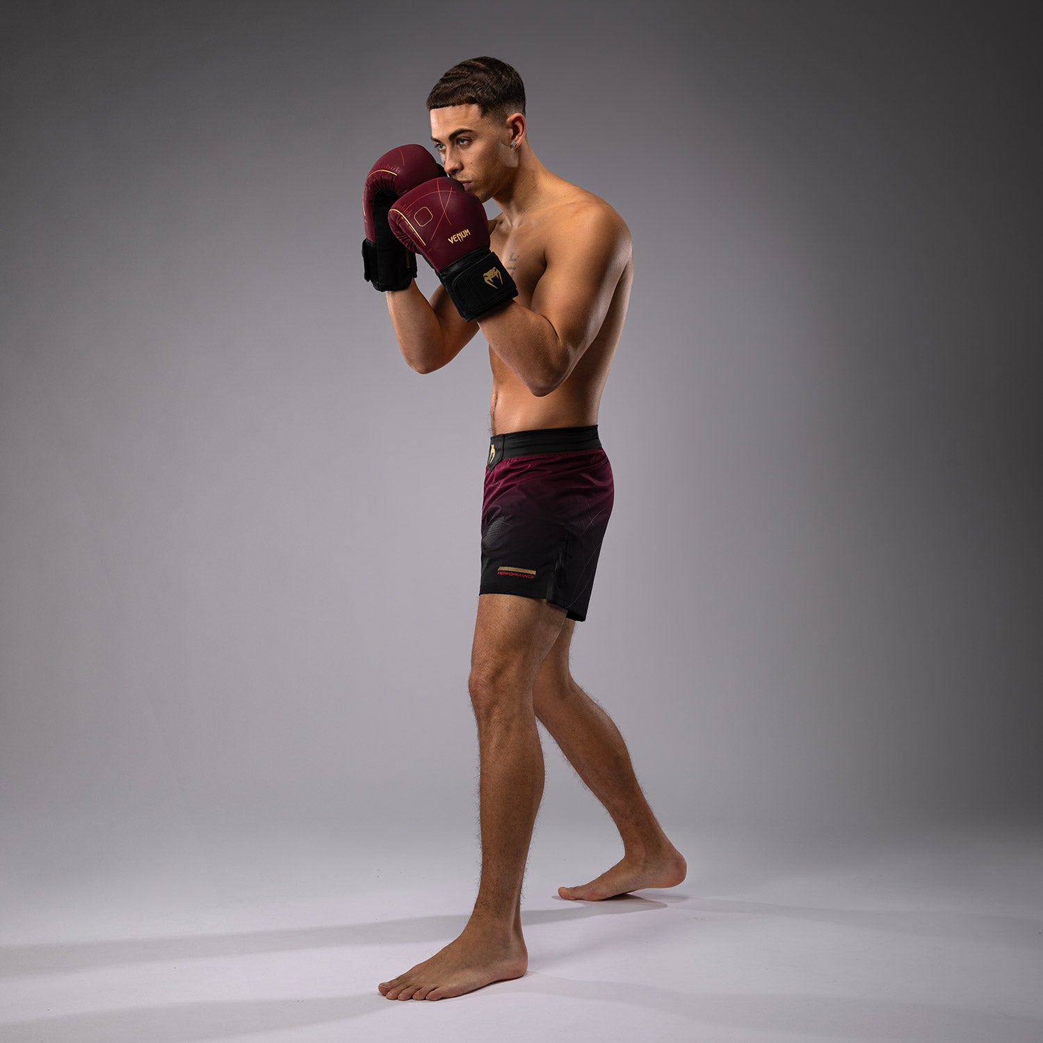 venum-tactical-xt-fight-shorts-schwarz-burgund-gold image 7