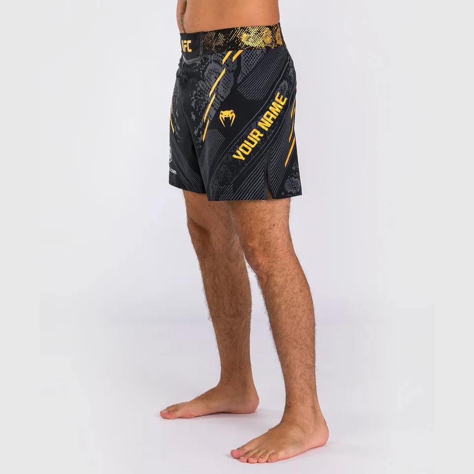 ufc-adrenaline-by-venum-authentic-fight-night-kampfshorts-schwarz-gold-kurze-pas image 1