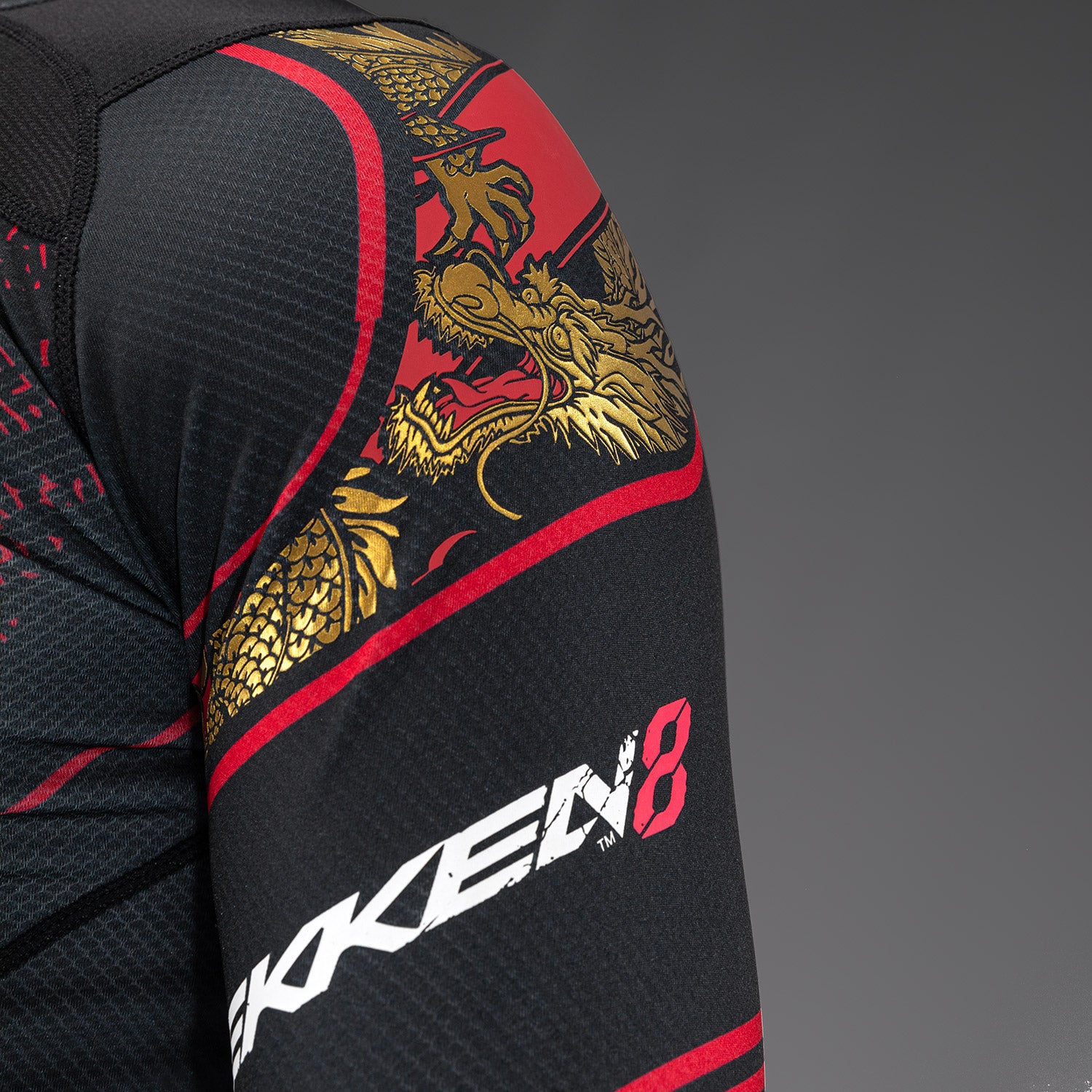 venum-x-tekken-8-marshall-law-rashguard-schwarz-rot-gold image 5