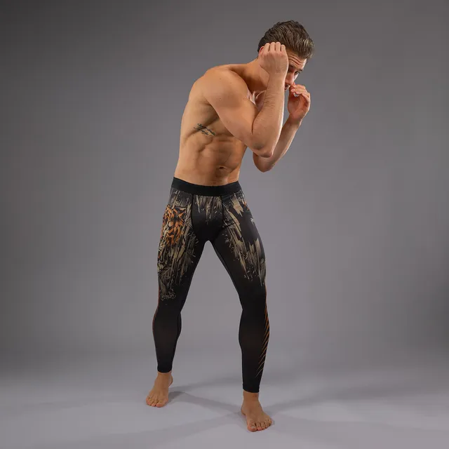 venum-tiger-herren-spats-schwarz-neonorange image 1