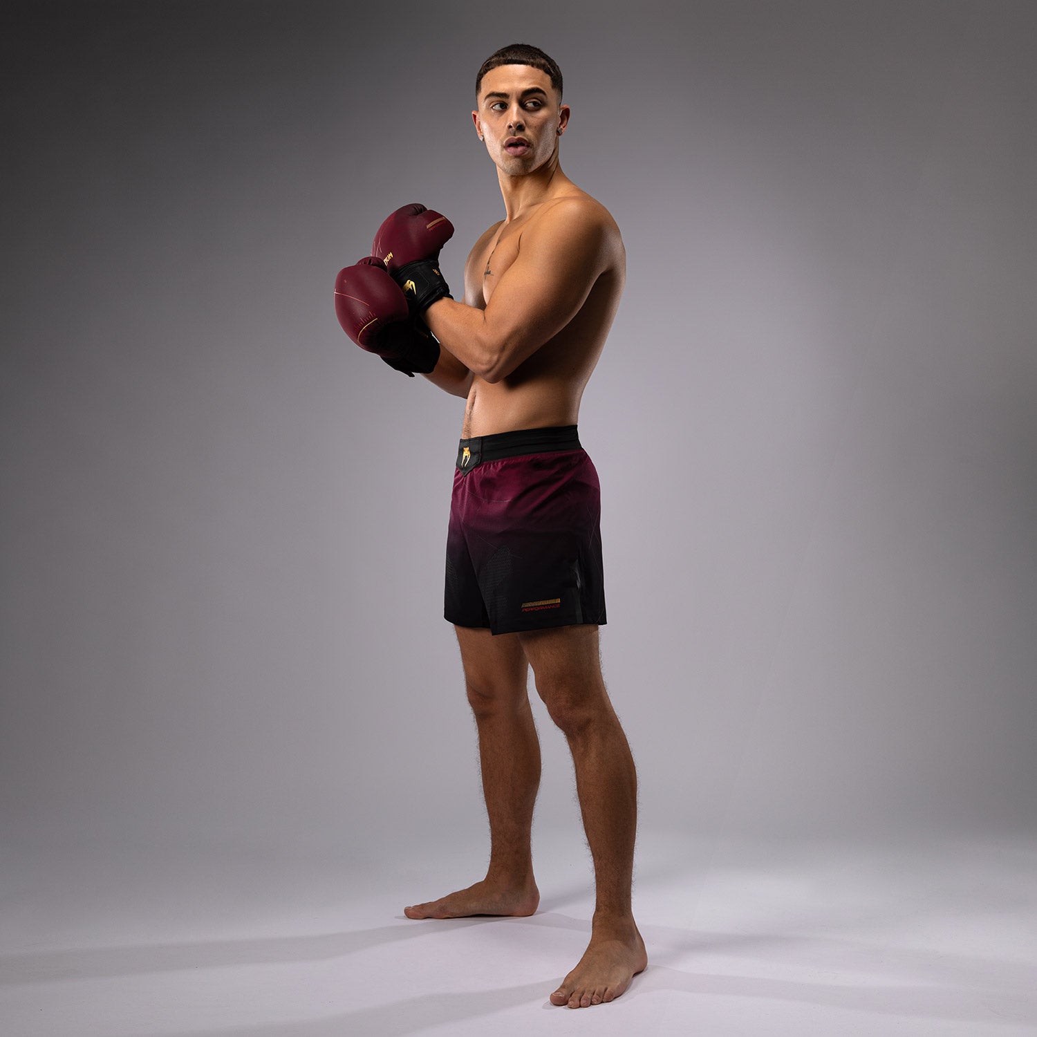 venum-tactical-xt-fight-shorts-schwarz-burgund-gold image 6