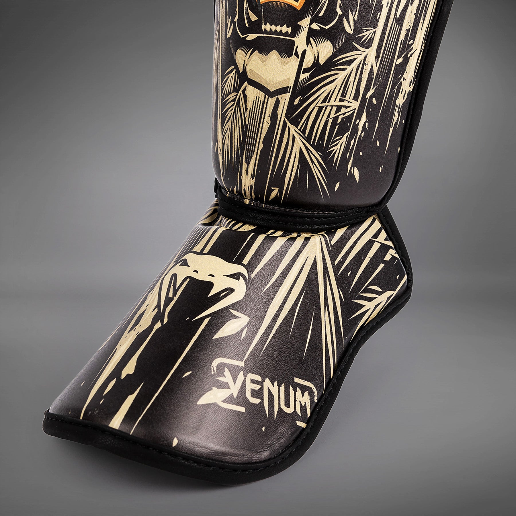venum-tiger-kinder-schienbeinschoner-schwarz-neon-orange image 4