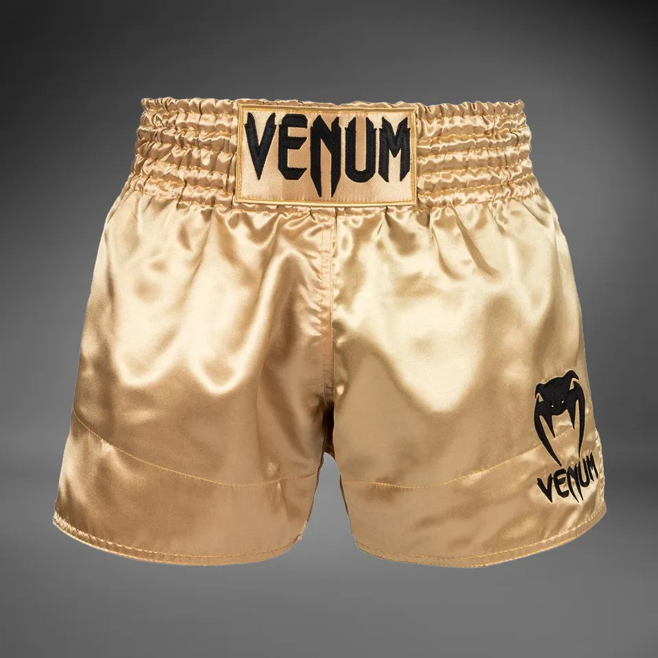 venum-klassische-thai-boxshorts-gold-schwarz image 1