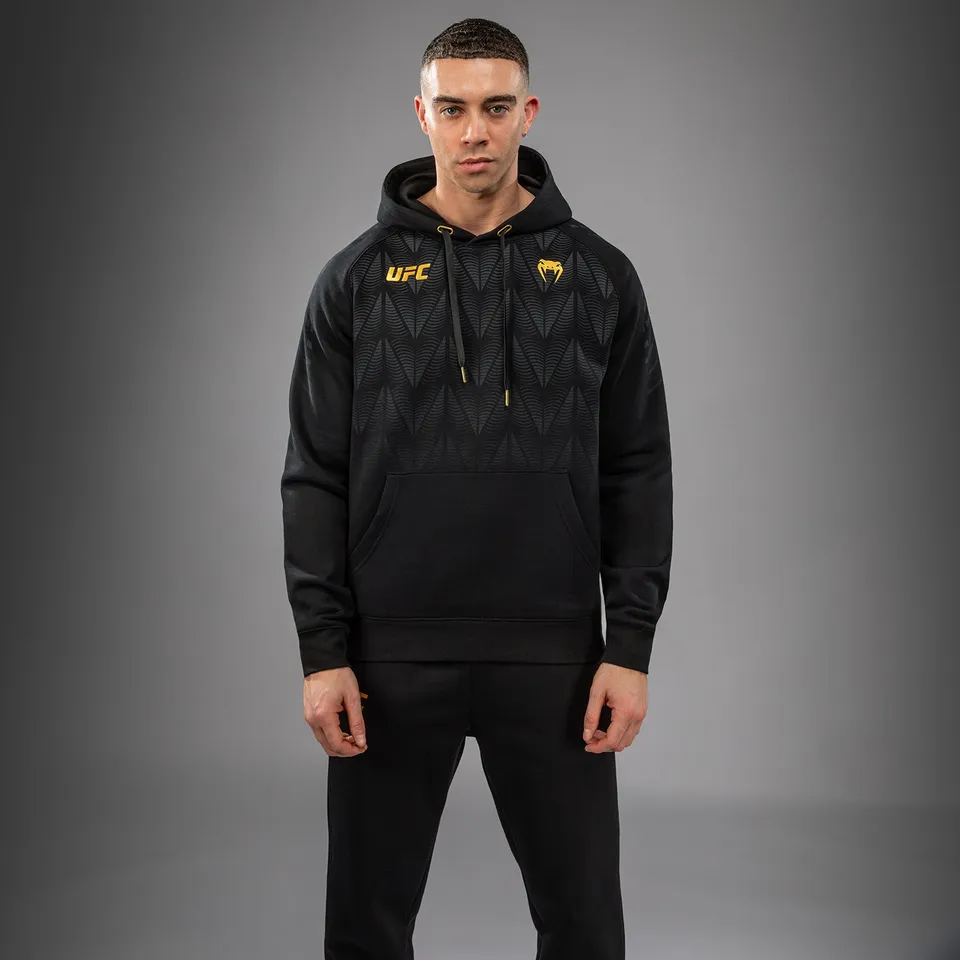 venum-ufc-zenith-by-venum-replica-pullover-hoodie-herren-champion-schwarz-gold image 1