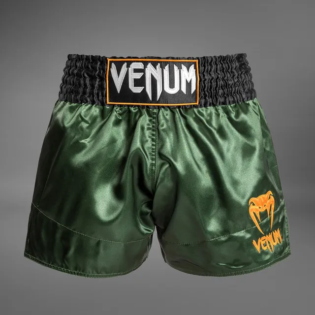 venum-classic-muay-thai-shorts-gr-n-gold-schwarz image 1