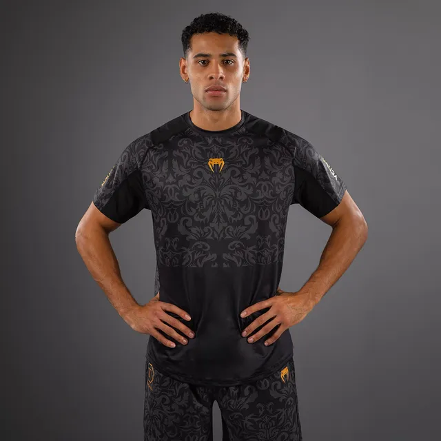 venum-x-topuria-unmatched-edition-dry-tech-shirt-schwarz-gold image 1