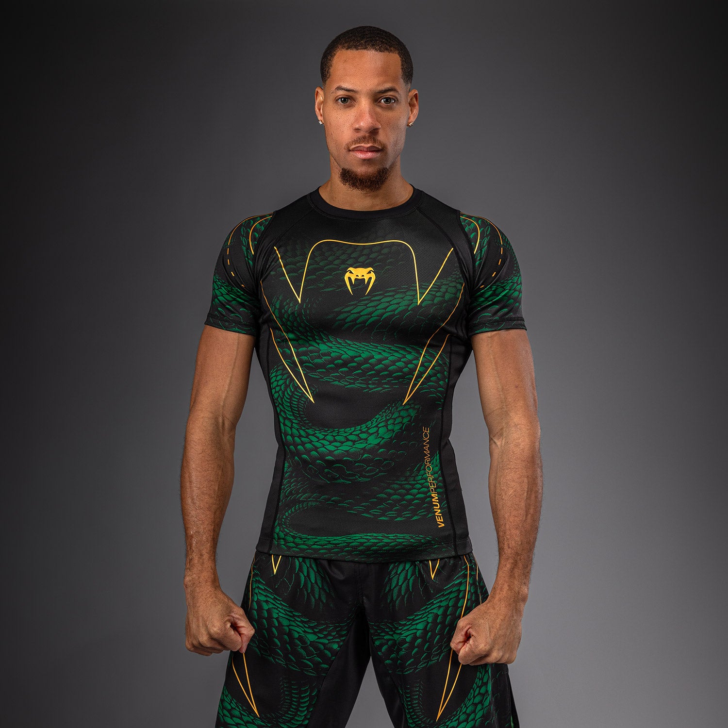 venum-matupa-kurzarm-rashguard-schwarz-gr-n-gold image 1