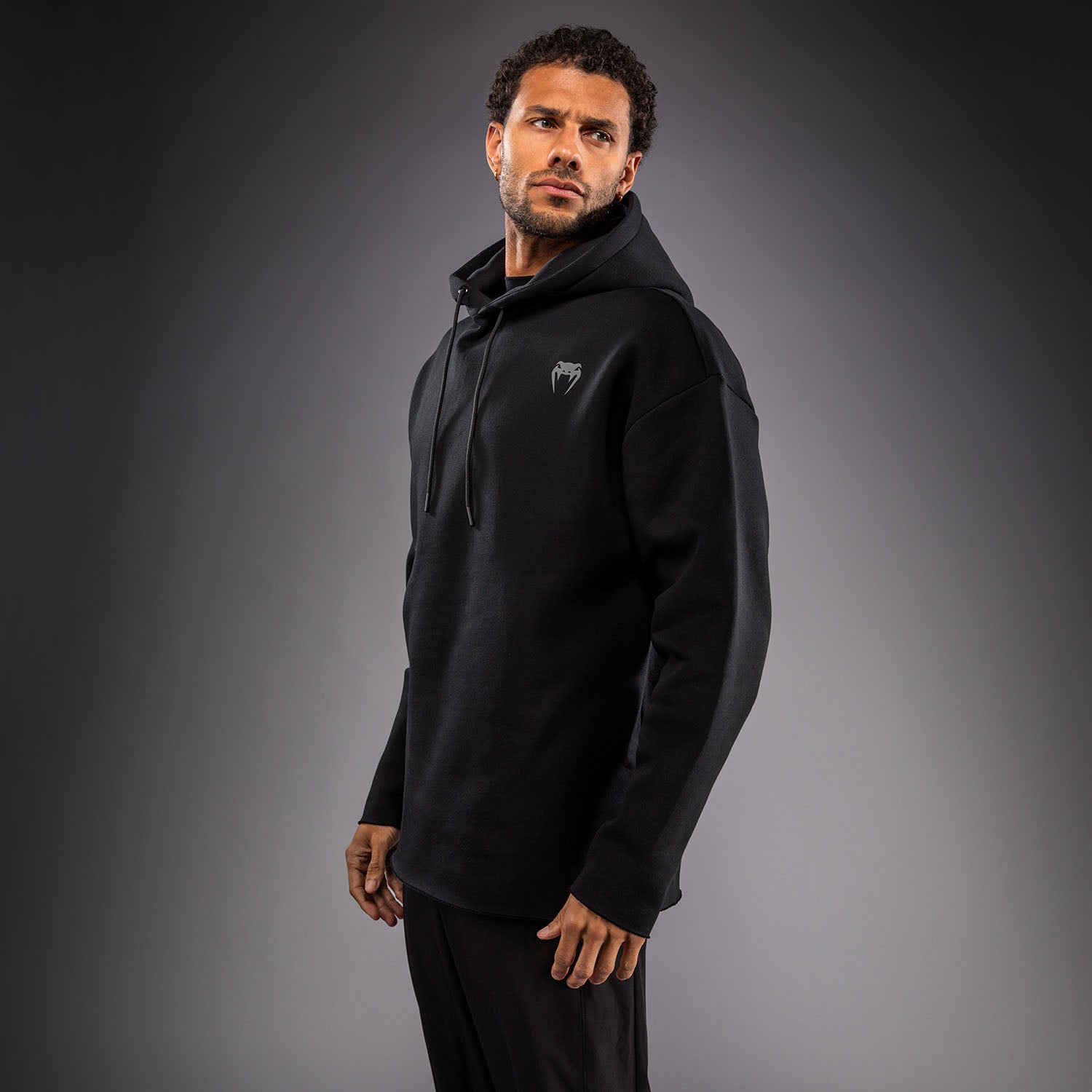 venum-divide-winter-kapuzenpullover-schwarz image 2